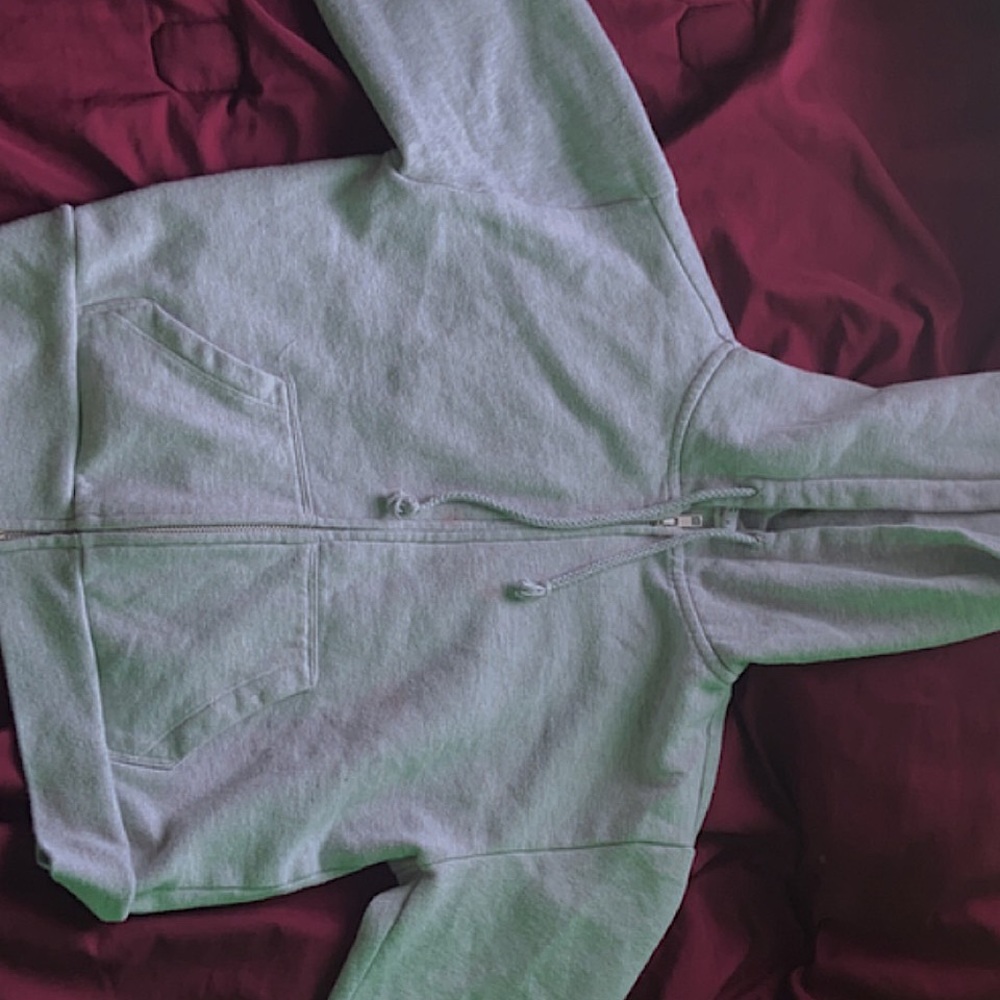 selling grey zip up crop sweatshirt